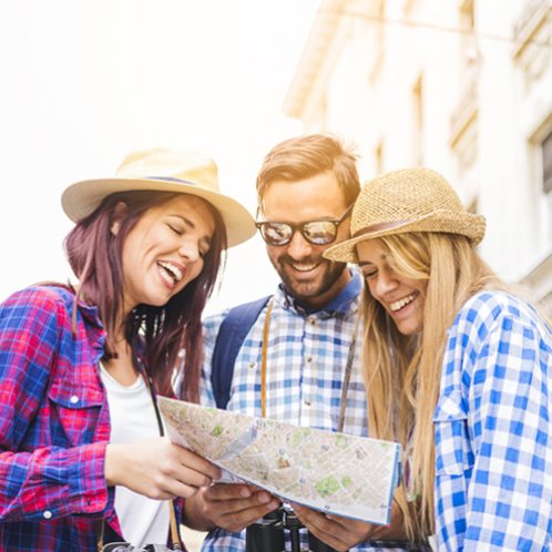 Group of travelers looking at a map